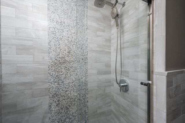 bathroom featuring a shower stall