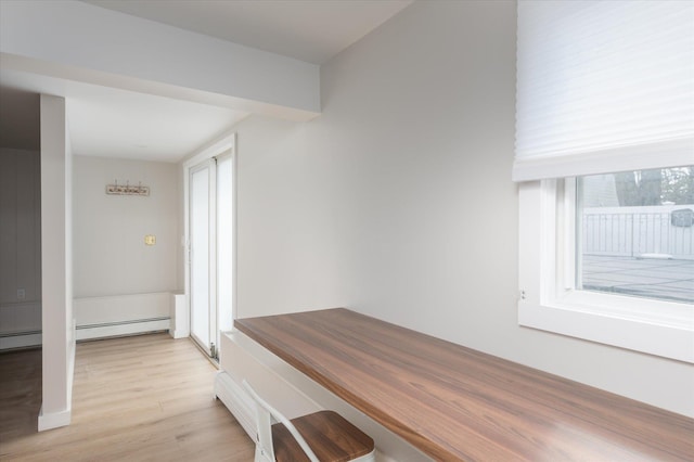 mudroom with light wood-style flooring