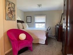 bedroom featuring carpet flooring