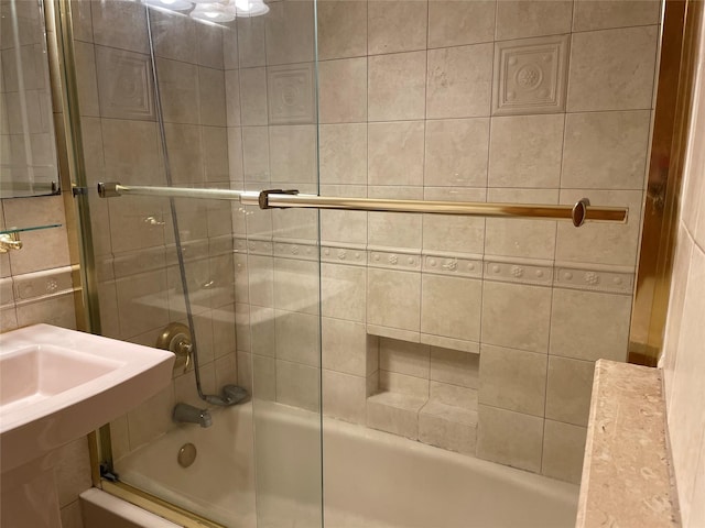 full bathroom with combined bath / shower with glass door