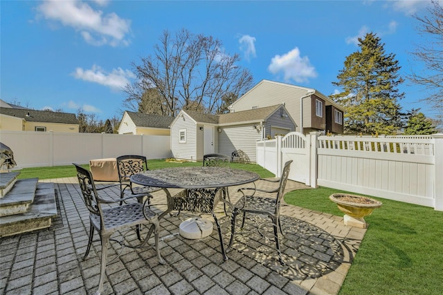 view of patio / terrace featuring a fenced backyard and outdoor dining space