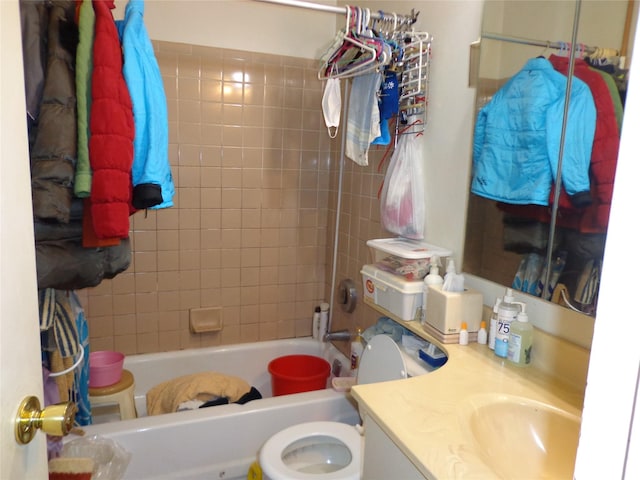 full bathroom featuring shower / washtub combination, vanity, and toilet