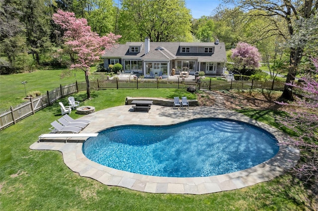 33 N Way, Chappaqua, NY 10514 - view of swimming pool featuring a patio, a fire pit, a yard, and a fenced in pool