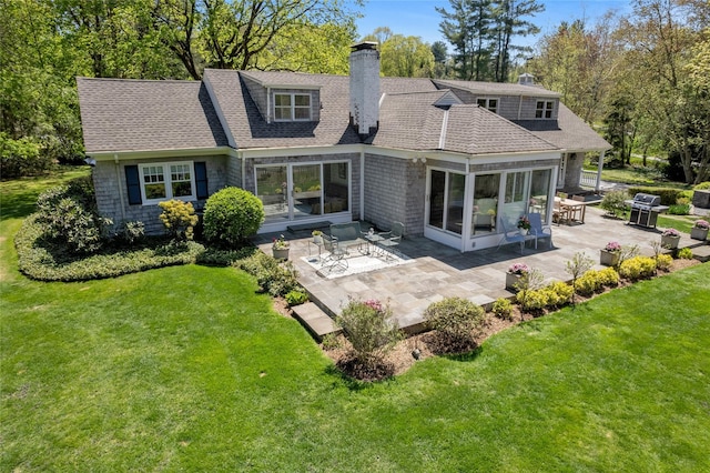 33 N Way, Chappaqua, NY 10514 - rear view of property with a shingled roof, a chimney, a yard, and a patio area