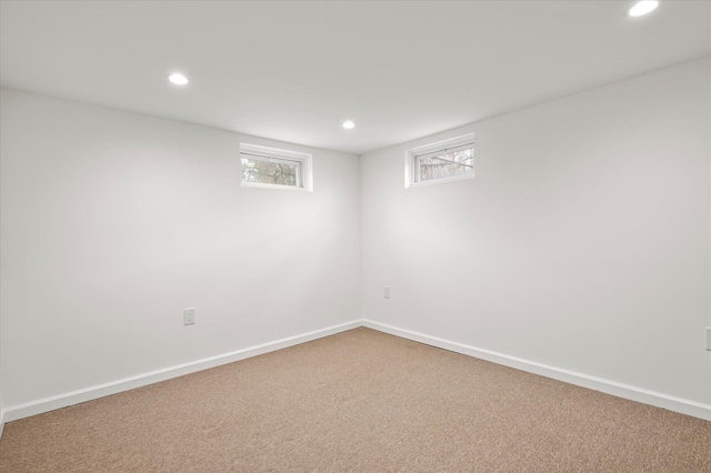 basement with recessed lighting, baseboards, and carpet floors