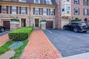 view of front of home with a garage and driveway