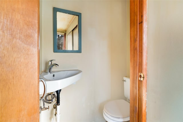 bathroom featuring toilet