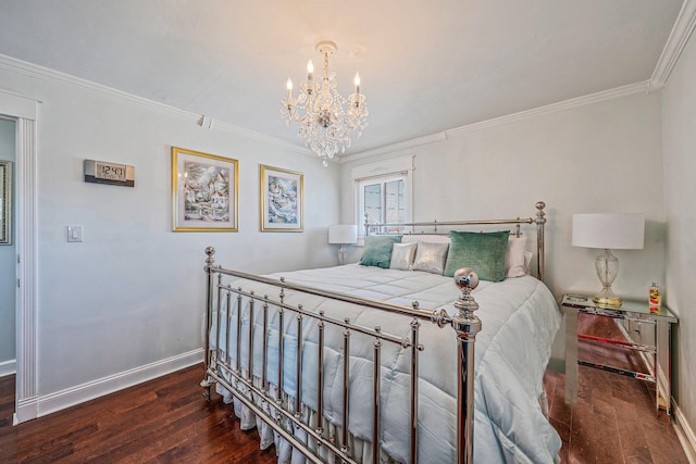 bedroom with a notable chandelier, wood finished floors, baseboards, and ornamental molding