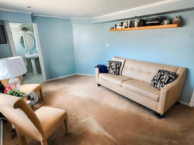 living room featuring baseboards and crown molding