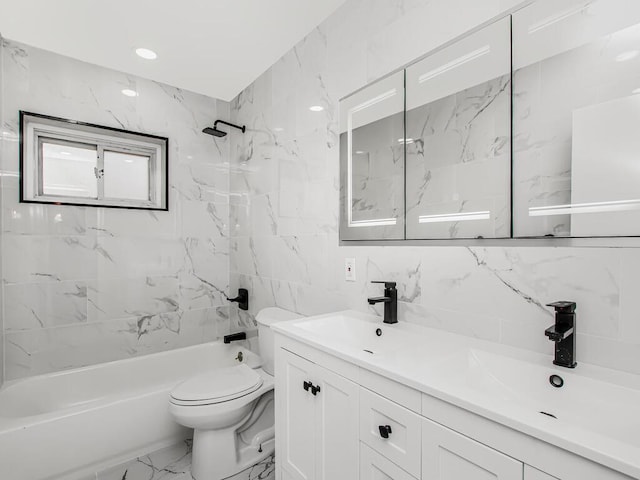 full bathroom featuring a sink, toilet, marble finish floor, and shower / washtub combination