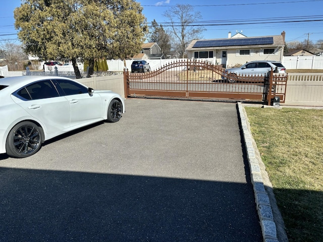 exterior space featuring a gate