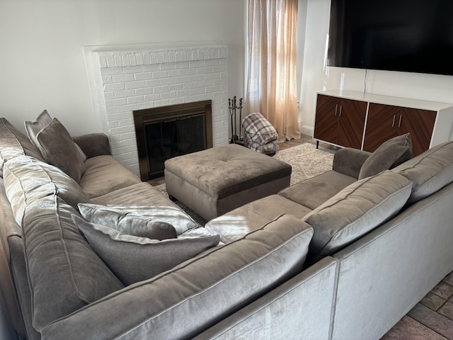 living area featuring a fireplace