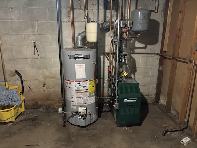 utility room featuring a heating unit and water heater