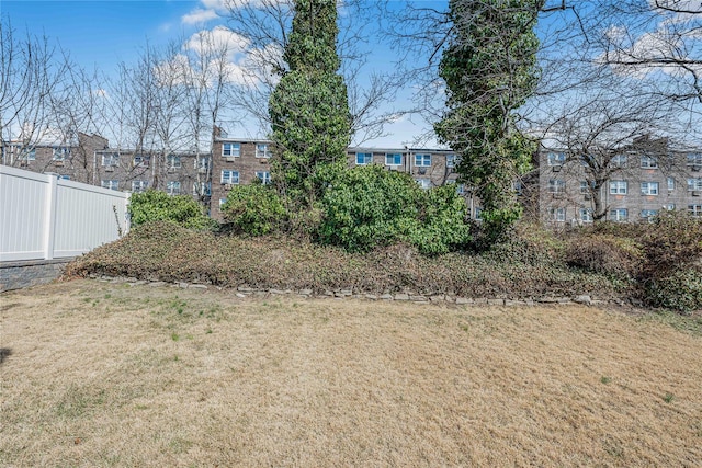 view of yard featuring fence