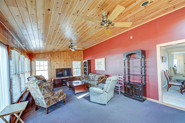 living room featuring wooden ceiling, carpet, baseboards, and lofted ceiling