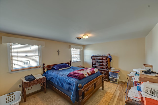 bedroom featuring light wood-type flooring