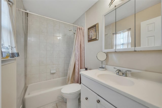 full bath with tile patterned flooring, toilet, vanity, and shower / bath combination with curtain