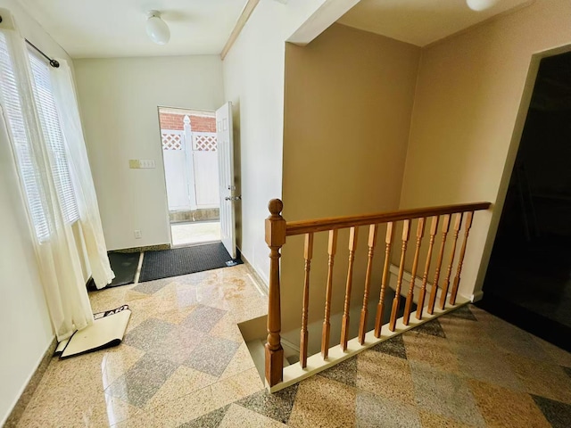 foyer entrance with baseboards