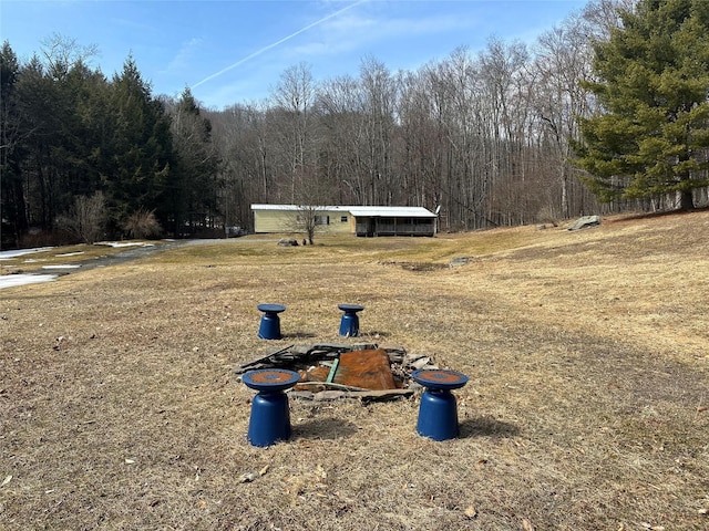 view of yard featuring a view of trees