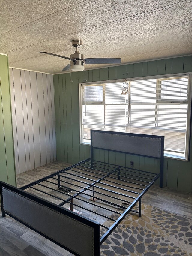 unfurnished bedroom with wood finished floors