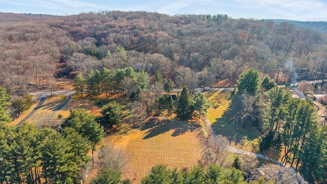 aerial view featuring a view of trees