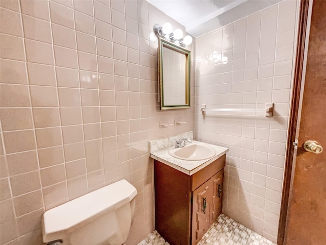 1 Charter Ln, Smithtown, NY 11787 - bathroom featuring vanity, tile walls, and toilet