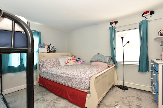 bedroom with baseboard heating, marble finish floor, and baseboards