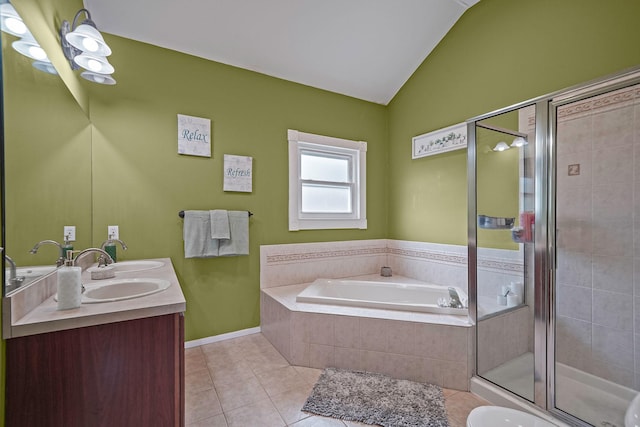 bathroom with a garden tub, lofted ceiling, double vanity, a stall shower, and tile patterned floors