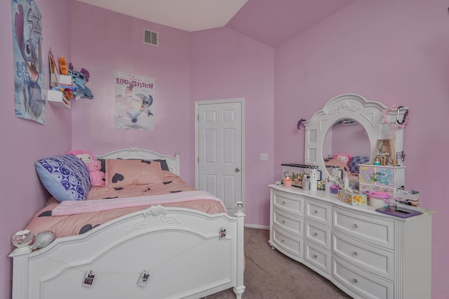 bedroom featuring visible vents, lofted ceiling, carpet, and baseboards