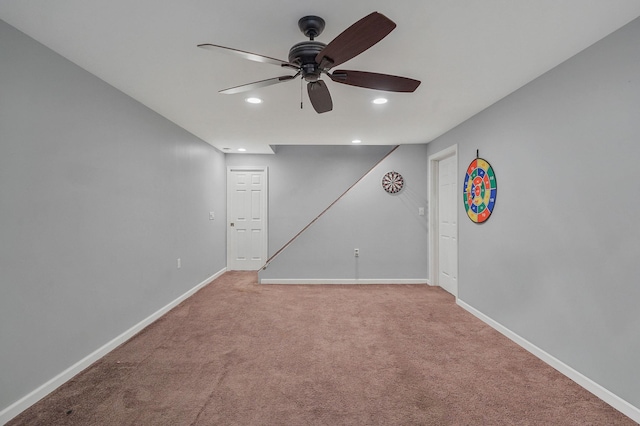 unfurnished room featuring recessed lighting, baseboards, light carpet, and a ceiling fan