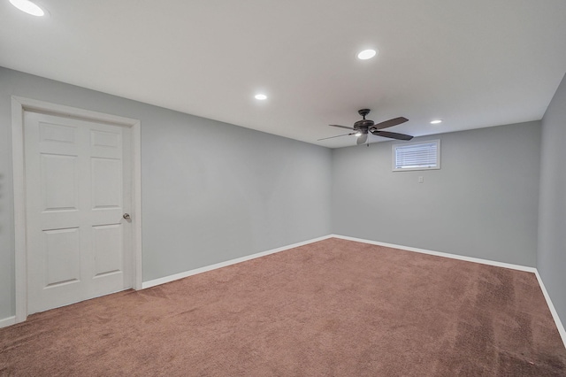 below grade area with recessed lighting, baseboards, carpet floors, and ceiling fan