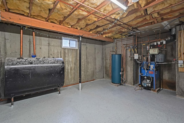 basement with heating fuel, water heater, and a heating unit