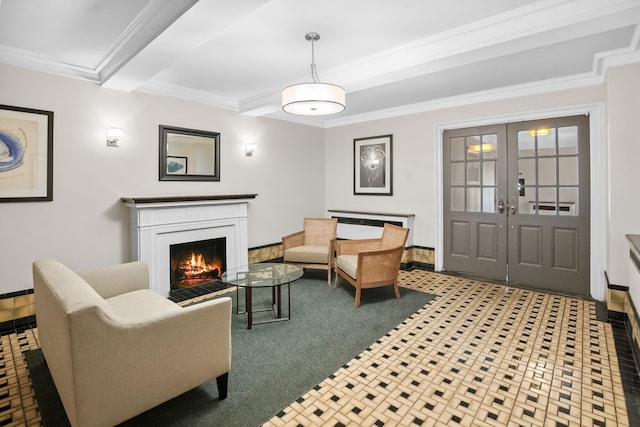 living room with crown molding, baseboards, a lit fireplace, beam ceiling, and french doors