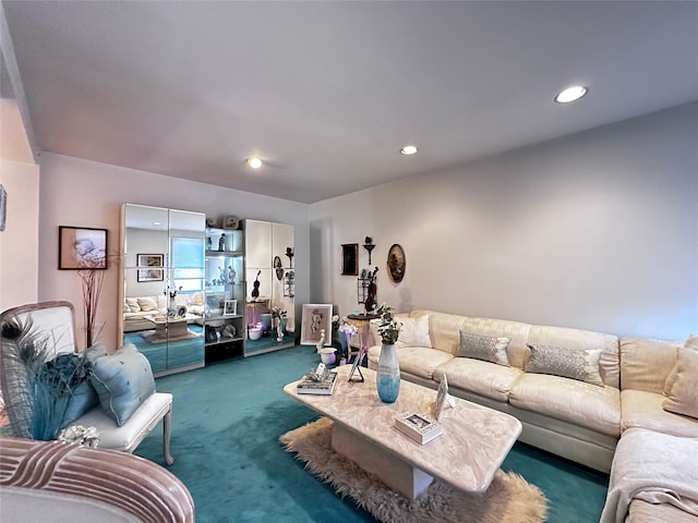 carpeted living room with recessed lighting