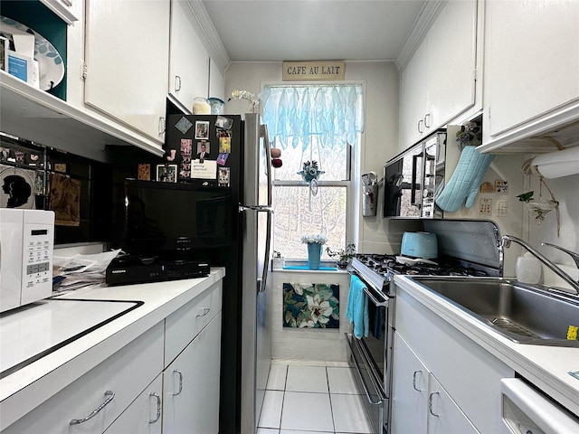 kitchen featuring white cabinetry, light countertops, and stainless steel appliances