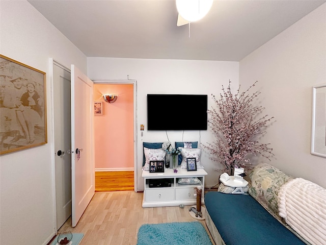 interior space with light wood finished floors and baseboards