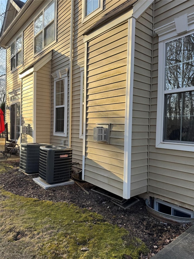 view of home's exterior with central AC