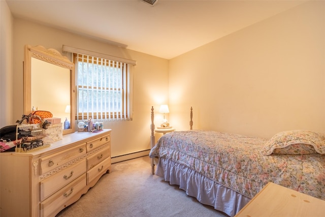 bedroom featuring a baseboard radiator and light carpet