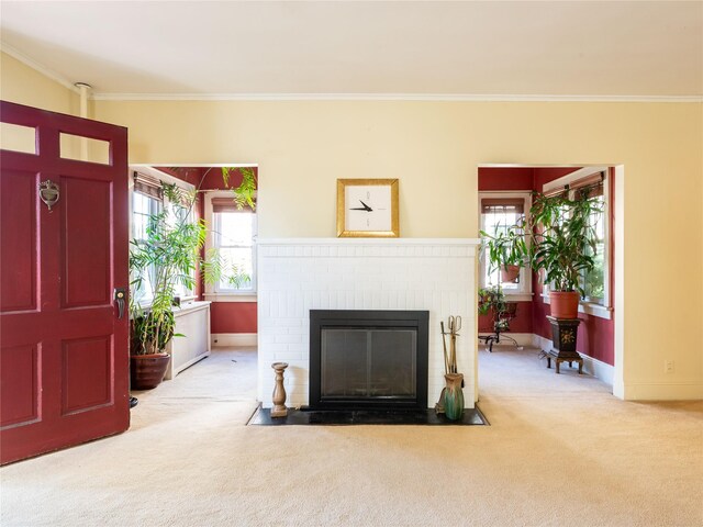 679 Saint Lukes Pl, Baldwin, NY 11510 - carpeted living room featuring ornamental molding, a fireplace, and baseboards