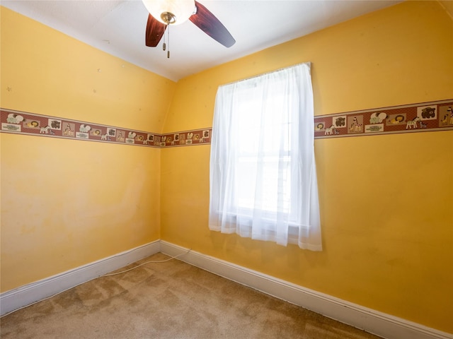 679 Saint Lukes Pl, Baldwin, NY 11510 - carpeted empty room with a ceiling fan and baseboards