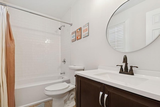 full bathroom with vanity, shower / tub combo, toilet, and tile patterned flooring