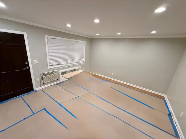 interior space with recessed lighting, baseboards, a wall unit AC, and ornamental molding