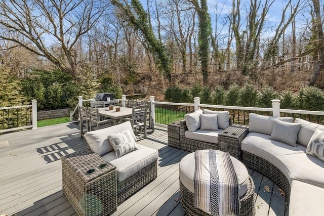 wooden deck featuring outdoor dining space and outdoor lounge area