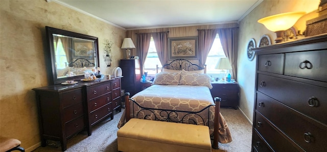 bedroom with baseboards, crown molding, and carpet
