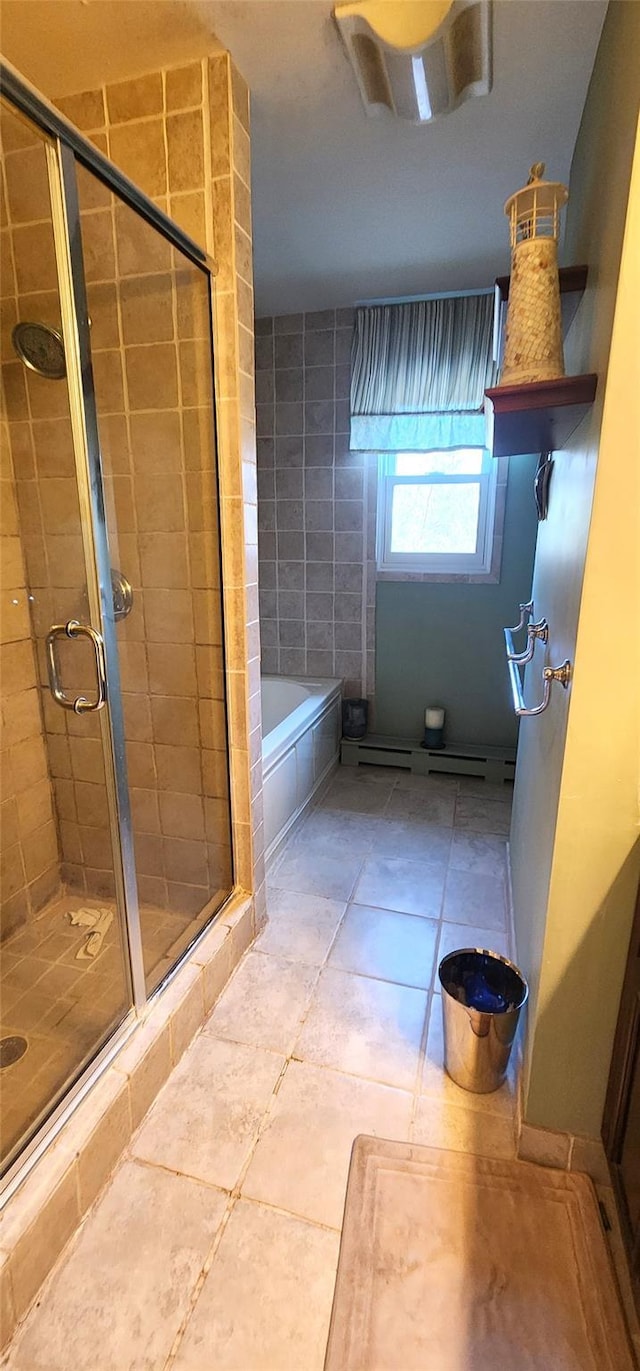 bathroom featuring a shower stall, a bath, visible vents, and tile patterned flooring