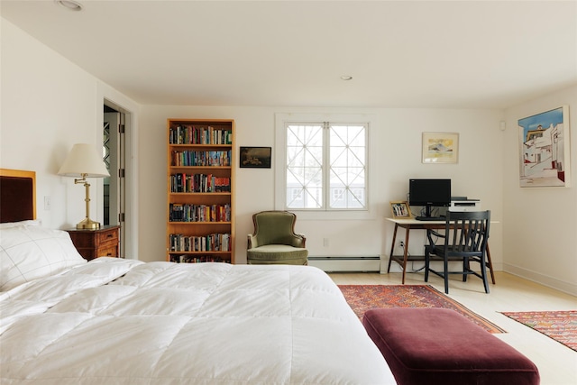26 Curry Ln, Hyde Park, NY 12538 - bedroom with a baseboard heating unit and wood finished floors