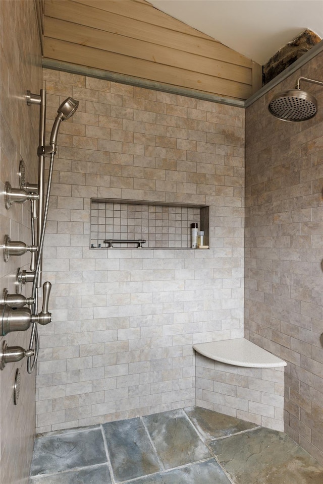 26 Curry Ln, Hyde Park, NY 12538 - bathroom with a tile shower and lofted ceiling