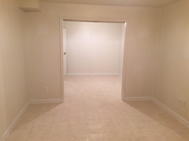 empty room with baseboards