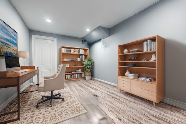 office area with recessed lighting, baseboards, and light wood-style floors