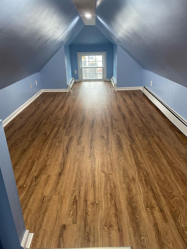 114-27 135th St, South Ozone Park, NY 11420 - additional living space with dark wood finished floors, baseboards, a baseboard heating unit, and lofted ceiling